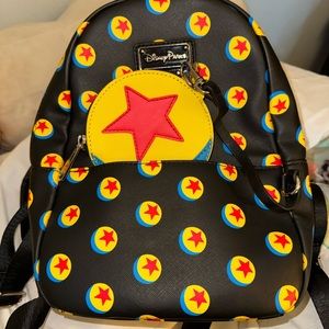 Disney parks pixar ball mini loungefly backpack and attached coin purse
